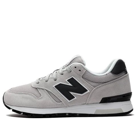 New Balance sneakers in grey with a black N logo